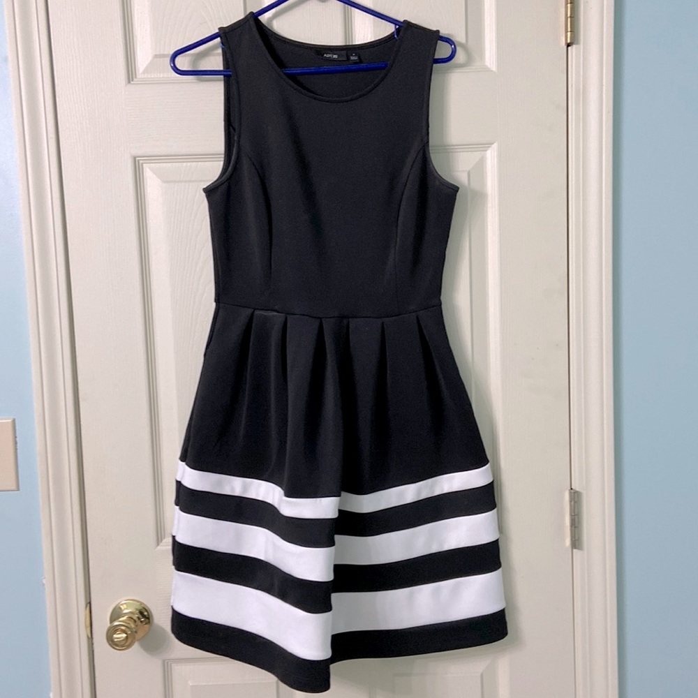 Cute little black dress. Good quality